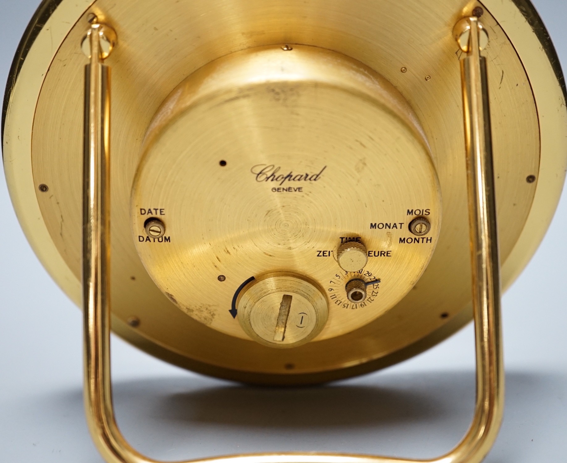 A Swiss Chopard travel desk alarm clock on stilt, 14cm diameter